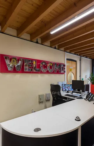 Welcome sign in IET Birmingham Austin Court reception